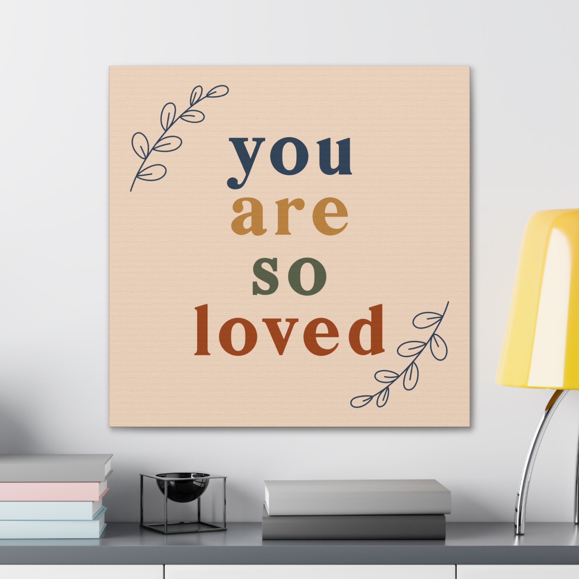 Nursery wall art featuring "You Are So Loved" message
