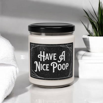 Funny poop candle with rustic black background
