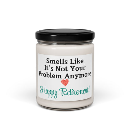 Close-up of "Happy Retirement" candle label with natural soy wax.
