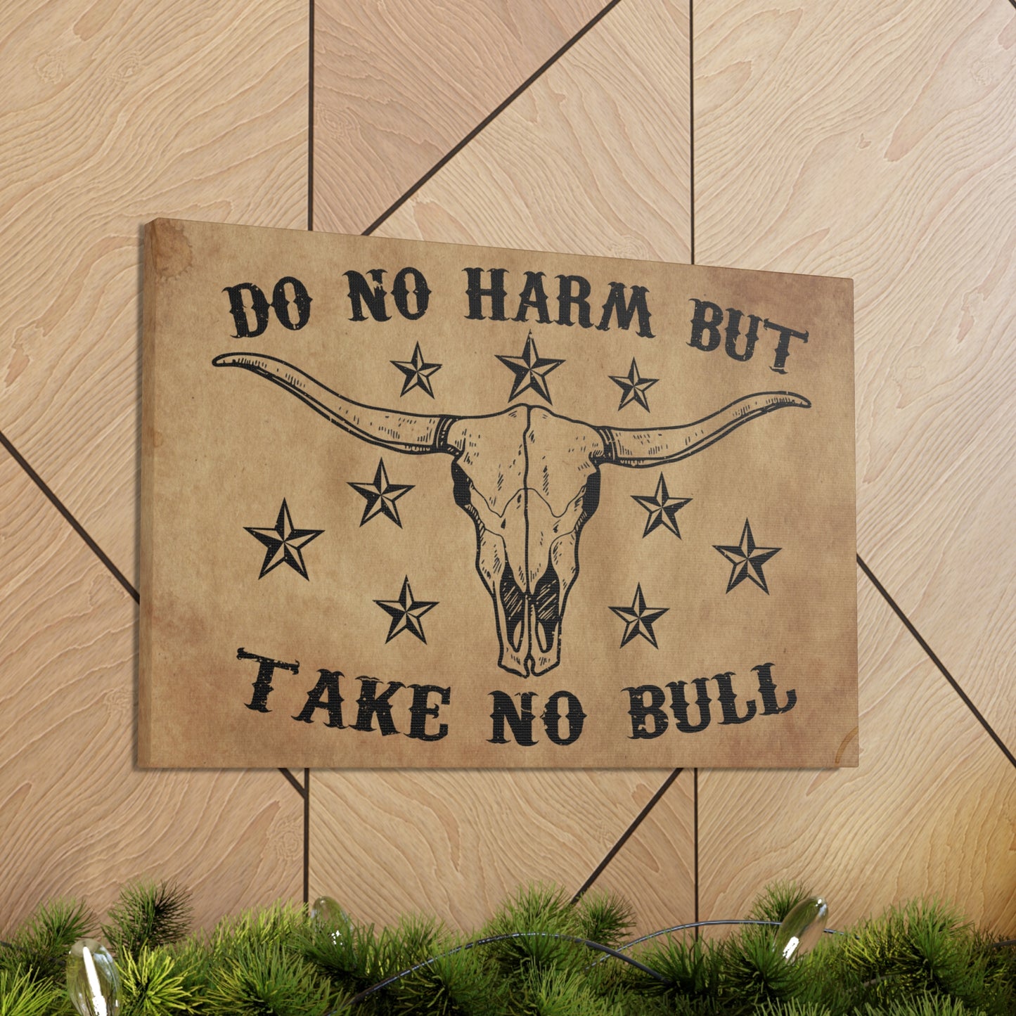 Western-style canvas featuring a longhorn skull and country quote.
