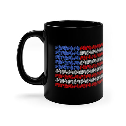 Patriotic black mug with colorful tractor American flag design.