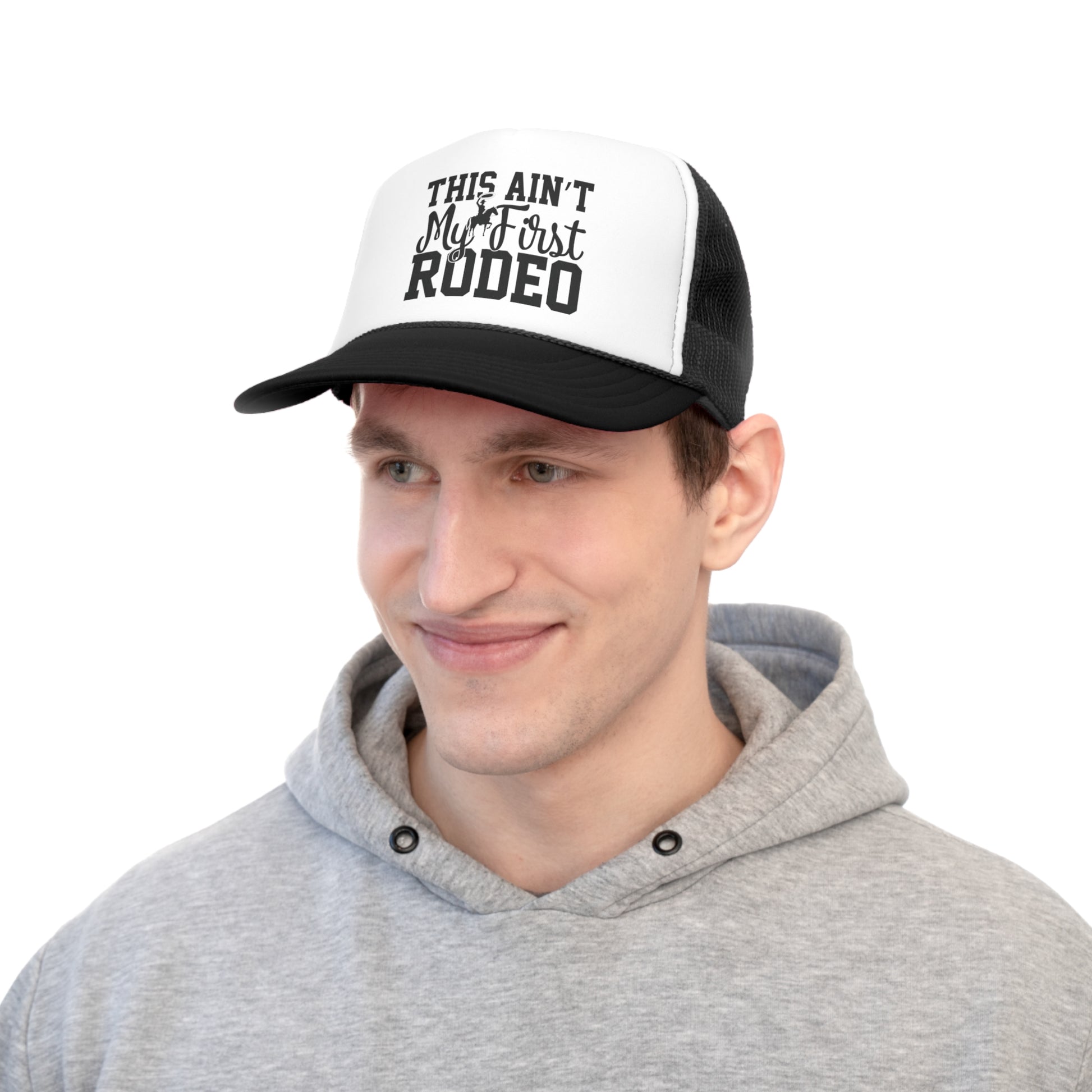 Black and white rodeo cap with "This Ain’t My First Rodeo" text
