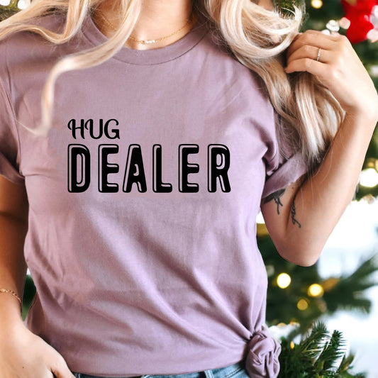 Playful "Hug Dealer" positive message tee