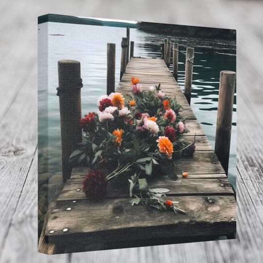 Romantic dockside photograph with bouquet of flowers on rustic wood
