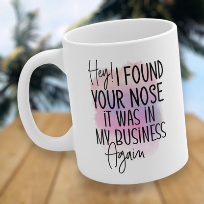 Funny mom mug with "I Found Your Nose in My Business Again" quote
