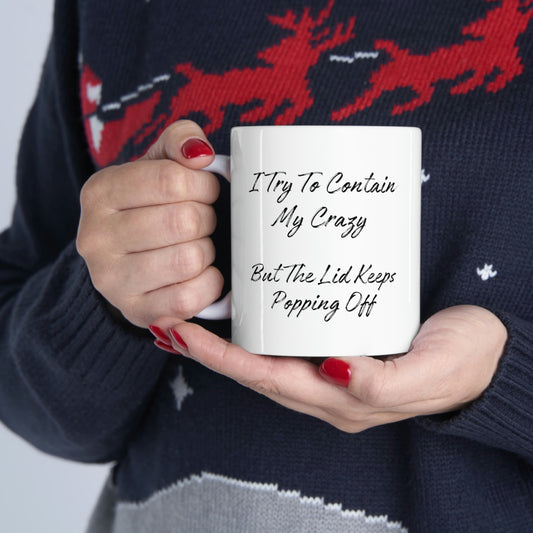 Sarcastic coffee mug with "I try to contain my crazy" message
