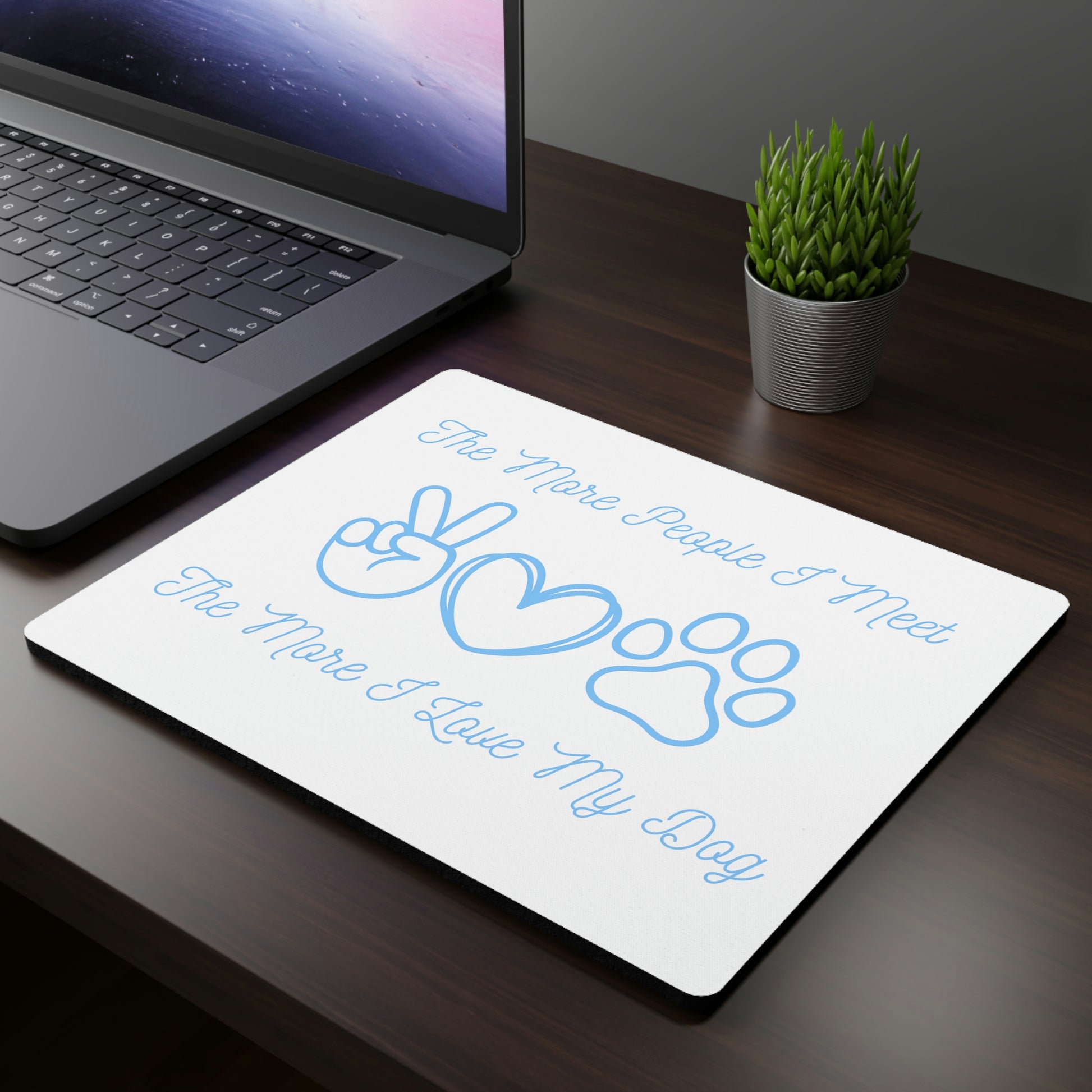 Blue mouse pad with peace, love, and dog design
