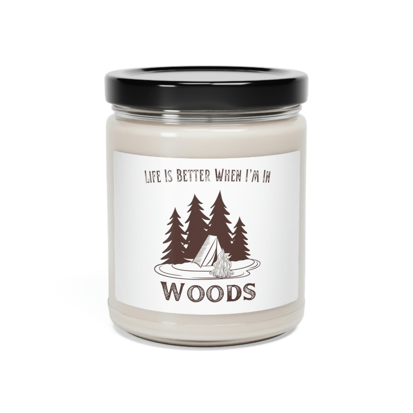 Tall trees and tent design on outdoor-themed candle
