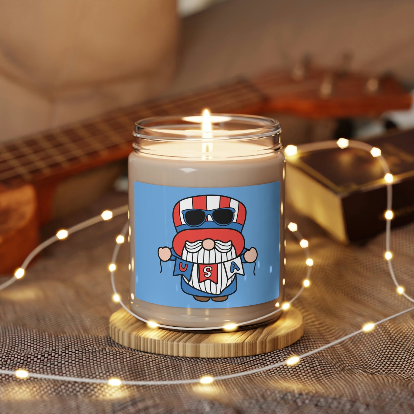 Gnome holding USA banner candle for patriotic decor
