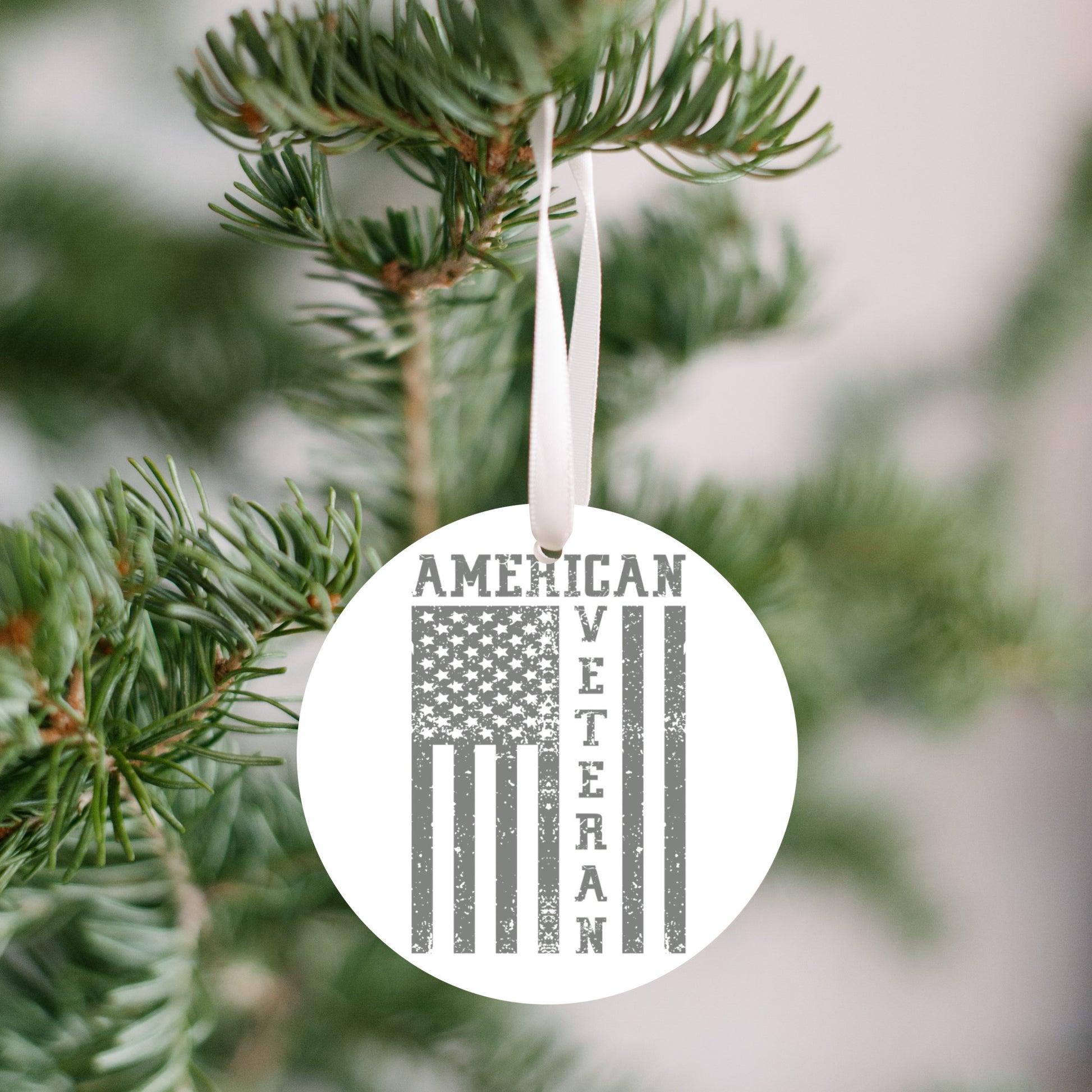 Retired military Christmas ornament with patriotic design
